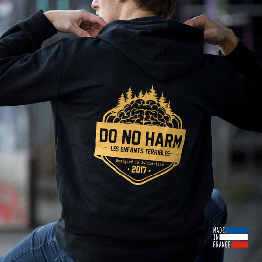Black unisex hoodie with message "Do no harm"