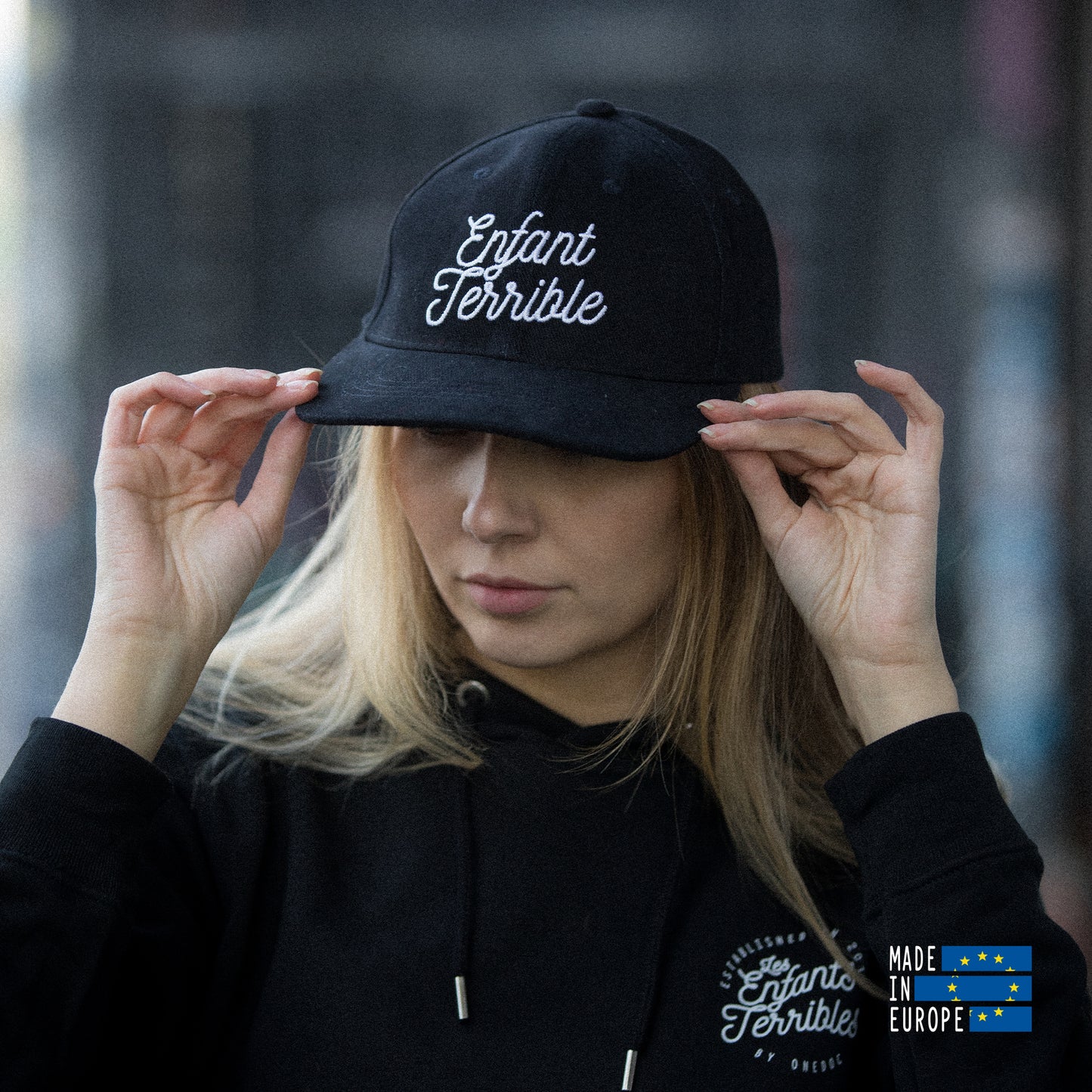Black cap with embroidery "Enfant Terrible"