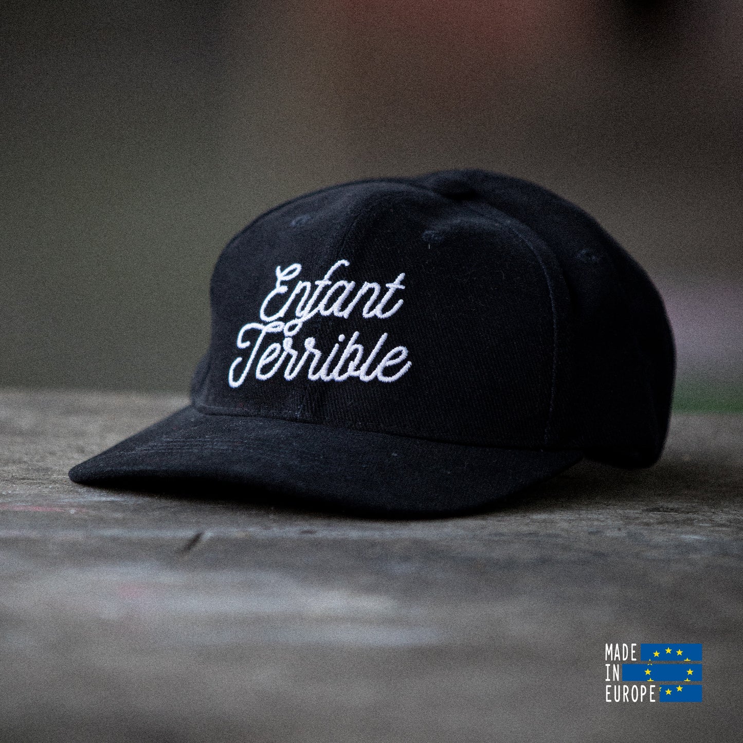 Black cap with embroidery "Enfant Terrible"