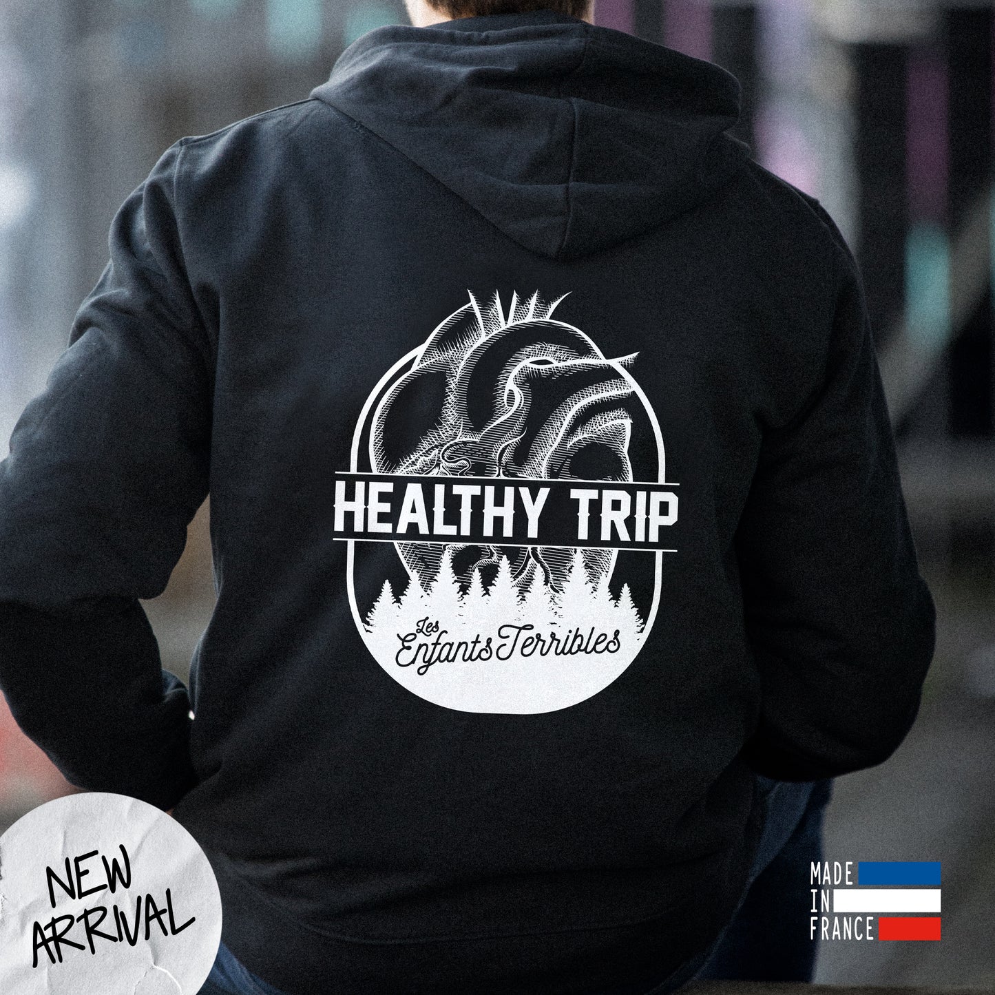 Black unisex hoodie with message "Healthy trip"